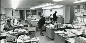  ??  ?? A view of The Reporter’s newsroom in the 1970s. News editor Al Roberts is seen at the far right.