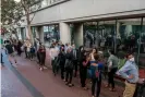  ??  ?? People line up for the fraud trial of Elizabeth Holmes outside the courthouse in San Jose on 8 September. Photograph: Nick Otto/ AFP/Getty Images