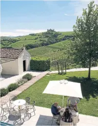  ?? ANDREA WYNER/THE NEW YORK TIMES ?? Like other wine-drinking venues in Piemonte, Palas Cerequio, a nine-room hotel, has taken a more casual air to raising a glass.