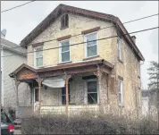  ?? PROVIDED ?? This house at 174 Hasbrouck Ave. in Kingston, N.Y., is one of three vacant structures purchased recently by the Kingston City Land Bank.