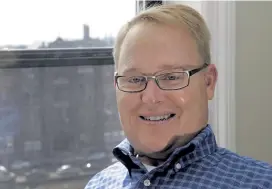  ?? Elise Amendola, Associated Press ?? Former Boston University hockey player Travis Roy poses in his apartment in downtown Boston in 2015. Roy has died at age 45.