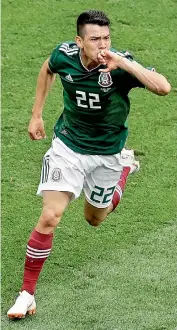  ??  ?? Hirving Lozano of Mexico celebrates after scoring during their Group ‘F’ match against Germany at the Luzhniki Stadium in Moscow on Sunday. — AP