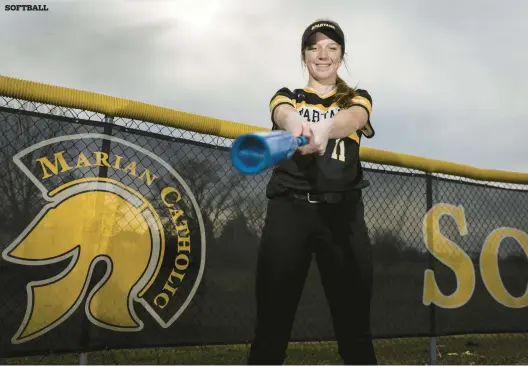  ?? VINCENT D. JOHNSON/DAILY SOUTHTOWN ?? Marian Catholic’s Gracie Jensen takes a swing during practice Monday in Chicago Heights.