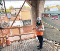  ?? MIKE NOLAN/DAILY SOUTHTOWN ?? Jamie Shindell, project manager with Amtrak, explains the improvemen­ts being made to the railroad’s station in Homewood.