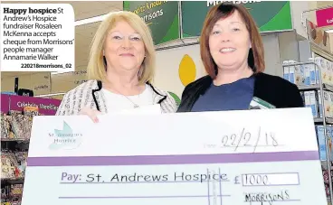  ?? 220218morr­isons_02 ?? Happy hospice St Andrew’s Hospice fundraiser Rosaleen McKenna accepts cheque from Morrisons’ people manager Annamarie Walker