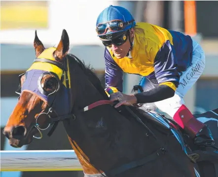  ?? Picture: AAP ?? Jockey Michael Cahill rides Alassak to victory at Doomben earlier this month.