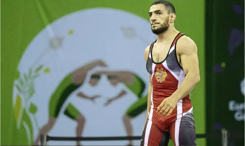  ??  ?? armenia’s Migran arutyunyan, silver medalist in the men’s Grecoroman 66kg category, had to contend with chants of ‘ russia, russia’ from 7,000 azeri spectators in his final against russia’s artem surkov at the 2015 european Games in Baku, azerbaijan on June 14. Photo: aFP
