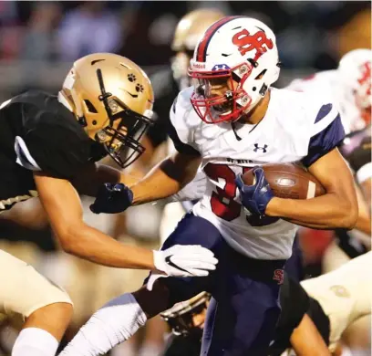 Catch him if you can: St. Rita's Kaleb Brown dominated last season at  running back. Now, he's also a receiver  with Alabama in pursuit.