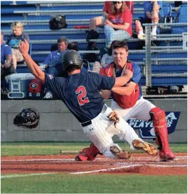  ??  ?? Josh Gibson tries to beat the throw to the plate while Jeffeson catcher Lane Watkins gets set to apply the tag. Heritage went on to rout the Dragons in a two-game sweep. (Catoosa News photo/Scott Herpst)