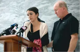  ?? ANTHONY VAZQUEZ/SUN-TIMES ?? Shannon Ryan (with her father, Michael Ryan) speaks at a press conference Wednesday to announce a lawsuit in the hit-and-run death of her mother.