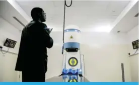  ??  ?? KAMPALA: A picture taken on January 19, 2018 shows a new Cobalt 60 Radiothera­py Machine being installed at Mulago hospital. — AFP