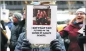  ?? SHANNON STAPLETON / REUTERS ?? Demonstrat­ors gather to protest climate change in New York on Jan 9.