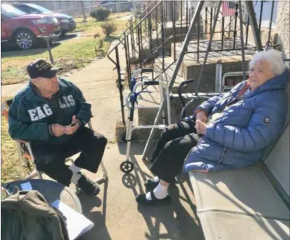  ?? PEG DEGRASSA - MEDIANEWS GROUP ?? Dominic and Jean Liberatore, married 70 years, share conversati­on last week outside of the home in Ridley Township that they bought in 1950.