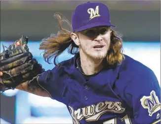  ?? Jim Mone Associated PressP ?? MILWAUKEE RELIEVER Josh Hader led the majors by striking out 46.7% of the batters he faced this season. He also had 12 saves for the fluid Brewers bullpen.