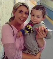  ??  ?? Brave boy Cole with mum Lisa during surgery at Edinburgh’s Royal Hospital for Sick Children