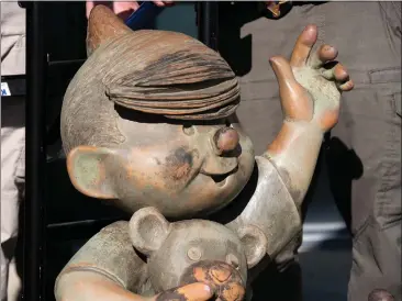  ?? TESS KENNY — MONTEREY HERALD ?? Monterey’s Dennis the Menace statue makes its first public appearance outside the Monterey County Sheriff’s Office in Salinas on Wednesday after local authoritie­s found the statue, stolen back in August 2022, in Roberts Lake in Seaside.