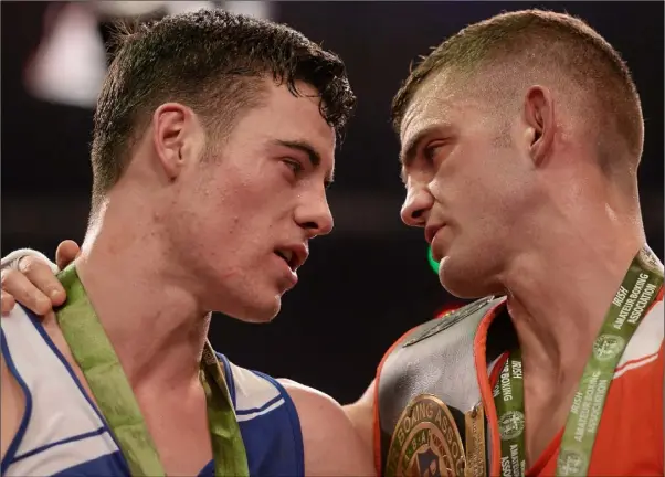  ??  ?? Adam Nolan (right) shows his respect for Martin Stokes of Drogheda, his young opponent in the national Senior final of December, 2015.