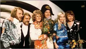  ??  ?? Members of Swedish group ABBA celebrate the victory of their song “Waterloo” in the Eurovision Song Contest in Brighton, England, in 1974.