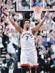  ?? THE CANADIAN PRESS ?? Toronto Raptors guard Kyle Lowry celebrates with the crowd after a basket during second half NBA basketball action against the Washington Wizards, in Toronto on Tuesday.