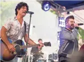  ??  ?? Dan + Shay’s song, “Tequila,” is nominated for single of the year and song of the year for the Country Music Associatio­n Awards.