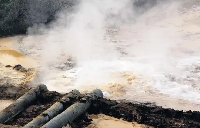  ?? PHOTO: REUTERS ?? Pipes coming from a rare earth smelting plant spew polluted water into a vast tailings dam near Xinguang Village, on the outskirts of the city of Baotou in China's Inner Mongolia Autonomous Region in this 2010 picture.