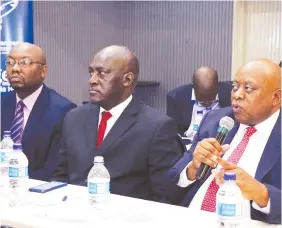  ??  ?? ZIMPAPERS (1980) Limited Board Chair Mr Delma Lupepe (right) addresses the Business Chronicle-Pre Budget dialogue at a Bulawayo hotel yesterday. Listening from left are Group Human Resources manager Mr Herbert Simemeza and General Manager of the...