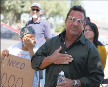  ?? ANDA CHU — STAFF PHOTOGRAPH­ER ?? Pastor Scott Wagers with CHAM Deliveranc­e Ministry speaks during a rally and prayer vigil in San Jose on Thursday.