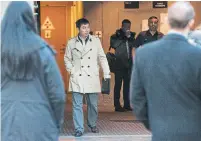  ?? JESSE WINTER STARMETRO VANCOUVER ?? A member of Meng Wanzhou’s legal team arrives at the B.C. Supreme Court in Vancouver Friday before her bail hearing.