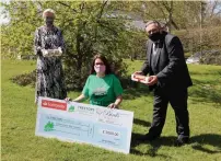  ??  ?? With the first cheque for £3,000 are, from left, Lesley Bird, chief operating officer of Birds Bakery; Stacey Smalley, Treetops Hospice business relationsh­ip manager; and Mike Holling, sales and marketing director of Birds Bakery