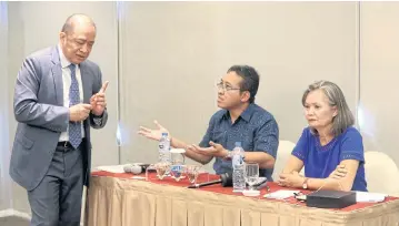  ?? AP ?? Cambodia’s ambassador to Indonesia Hor Nambora, left, interrupts the press conference held by Mu Sochua, right, in Jakarta on Wednesday.