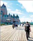  ?? HAGBERG/AFP LARS ?? A police officer patrols near Chature Fronenac ahead of the G7 summit in Quebec City, Ontario, on Wednesday.