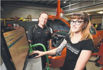  ?? Picture: AAP/STEVE POHLNER ?? GUIDANCE: Mentor Andrew Bear has helped apprentice Clare Maxwell through the traditiona­lly maledomina­ted automotive industry.