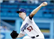  ??  ?? AP PHOTO BY ALEX GALLARDO In this July 5, file photo, Los Angeles Dodgers starting pitcher Alex Wood throws to the plate during a game against the Arizona Diamondbac­ks, in Los Angeles.