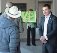  ?? DAVID WALLACE/THE REPUBLIC ?? Former U.S. Senate candidate Daniel McCarthy attends a Dec. 14 protest at the state Capitol.