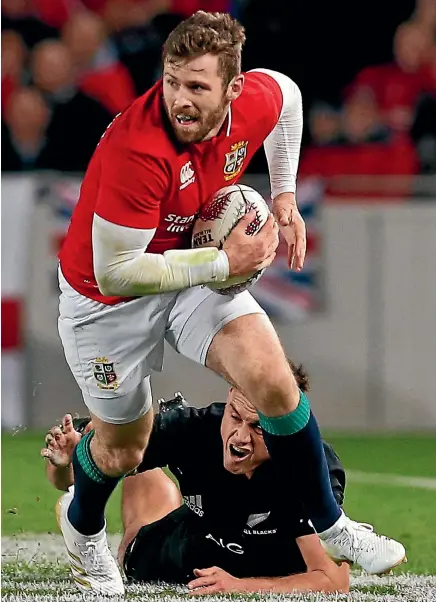  ?? REUTERS ?? British and Lions wing Elliott Daly makes a break past his opposite Israel Dagg at Eden Park last night.