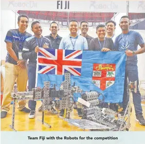  ??  ?? Team Fiji with the Robots for the competitio­n