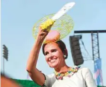  ?? Antonin Kélian Kallouche/Gulf News ?? ■ Oksana Belyeaeva of Russia celebrates after winning the Style Stakes Best Hat award.