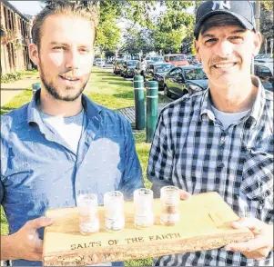  ?? MITCH MACDONALD/THE GUARDIAN ?? Nathan Gamauf, left, and Darren Blanchard, of the P.E.I. Sea Salt Company, show the products from their Salts Of The Earth social campaign, which aims to be a fundraisin­g tool for community organizati­ons while raising money for Random Acts of Kindness...