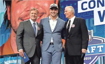  ?? ERIC GAY/AP ?? NFL Commission­er Roger Goodell, left, and former Cowboys player Bob Lilly, right, pose with Connor Williams, an offensive lineman whom Dallas chose in the second round.