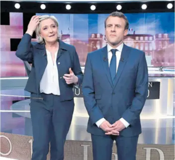  ??  ?? Analitičar­i su izbrojili da je u TV ringu Emmanuel Macron čak 13 puta rekao Marini le Pen da laže