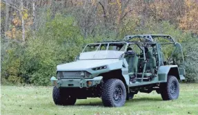  ?? ERIC SEALS/USA TODAY NETWORK ?? General Motors Defense shows off it new Infantry Squad Vehicle (ISV) on Tuesday at a news conference at the GM Milford Proving Grounds in Milford, Mich. The vehicle can carry up to nine soldiers and was developed with the input of military personal.