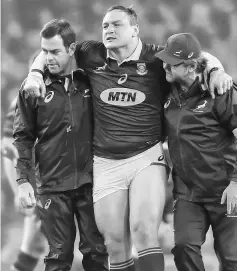  ??  ?? South Africa’s prop Coenie Oosthuizen leaves the field with an injury during the autumn internatio­nal rugby union test match between Ireland and South Africa at the Aviva stadium in Dublin. — AFP photo