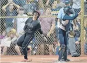  ?? MICHAEL LAUGHLIN/STAFF PHOTOGRAPH­ER ?? Cooper City’s Kassandra Espinosa scores the game-winning run in the 9th inning of Friday’s regional final.