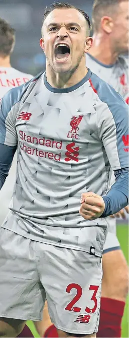  ?? Picture: Getty. ?? Xherdan Shaqiri celebrates after scoring Liverpool’s third goal at Turf Moor.