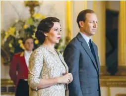  ?? (Sophie Mutevelian/Netflix/TNS) ?? OLIVIA COLMAN as Queen Elizabeth II and Tobias Menzies as Prince Philip in the third season of Netflix’s ‘The Crown.’