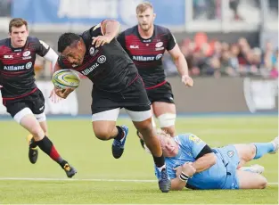  ??  ?? Bulldozer: Mako Vunipola escapes from Petrus Du Plessis to score