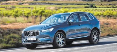  ?? FOTOS: VOLVO ?? Der neue XC60 wirkt – zumindest optisch – ein bisschen schnittige­r als sein großer Bruder XC90.