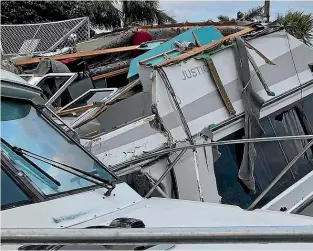  ?? ?? A number of boats sank and several came off their moorings at Tutukaka Marina because of the tsunami and cyclone surge.