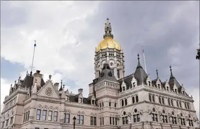  ?? Hearst Connecticu­t Media file photo ?? The Connecticu­t State Capitol building in Hartford. Eligible families for the tax credit must apply with the Department of Revenue Services between June 1 and July 31 to receive the rebate of $250 per child for a maximum of three children.