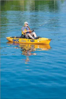  ?? Photo submitted ?? Bella Vista lakes offer “no-wake” options for those wanting to go out in a kayak for a smooth day trying to land the big one.